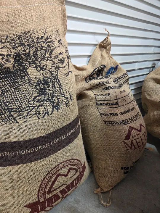 Burlap coffee sacks in the roastery