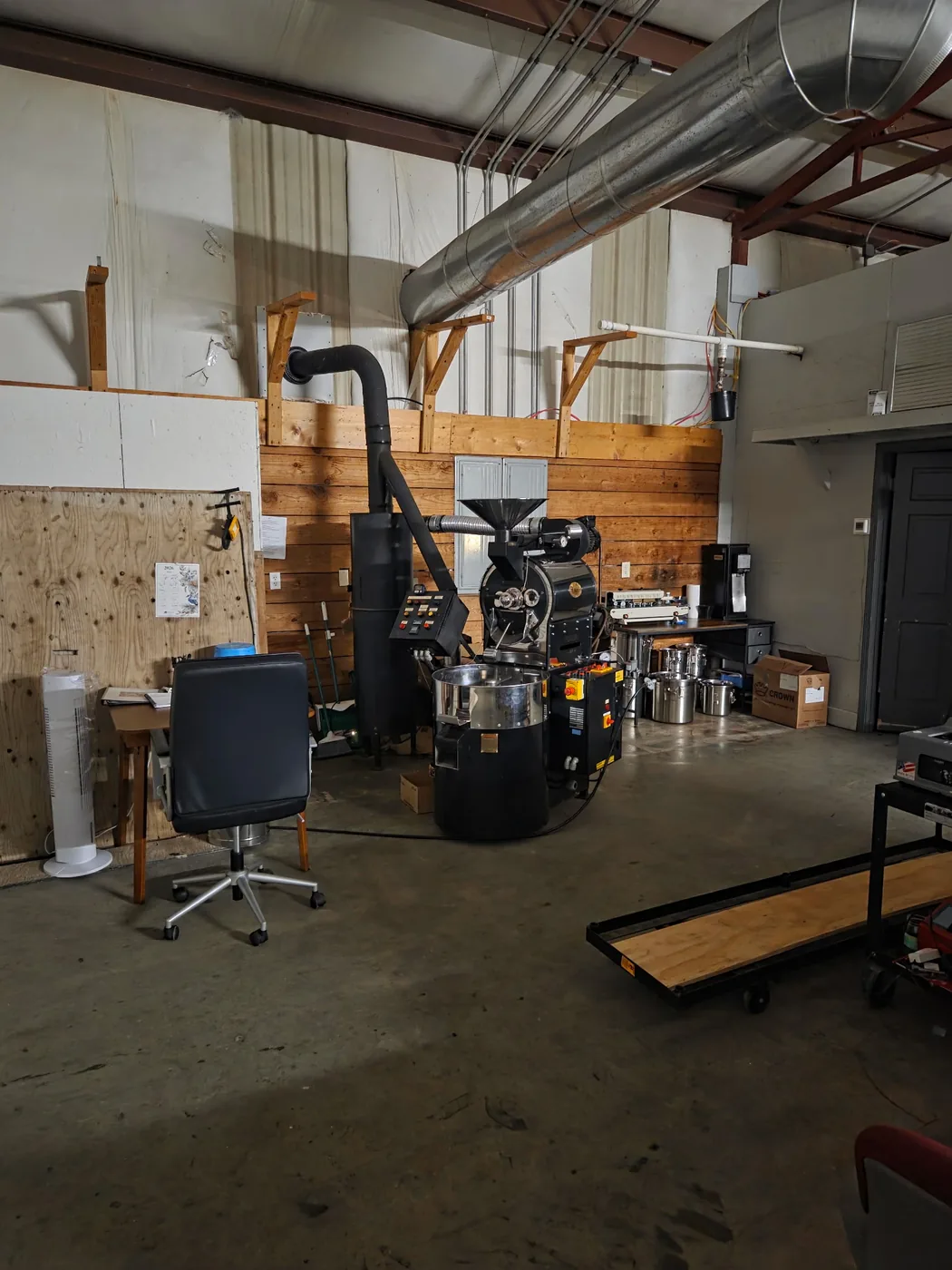 The Brotherhood Coffee roastery space with roasting equipment
